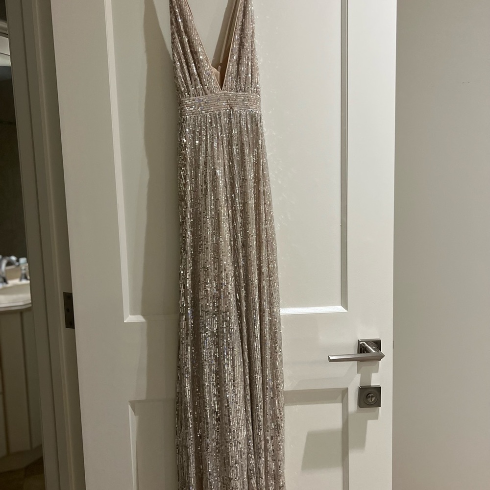 Shimmery champagne full length dress. Perfect for a wedding guest or bridesmaid.